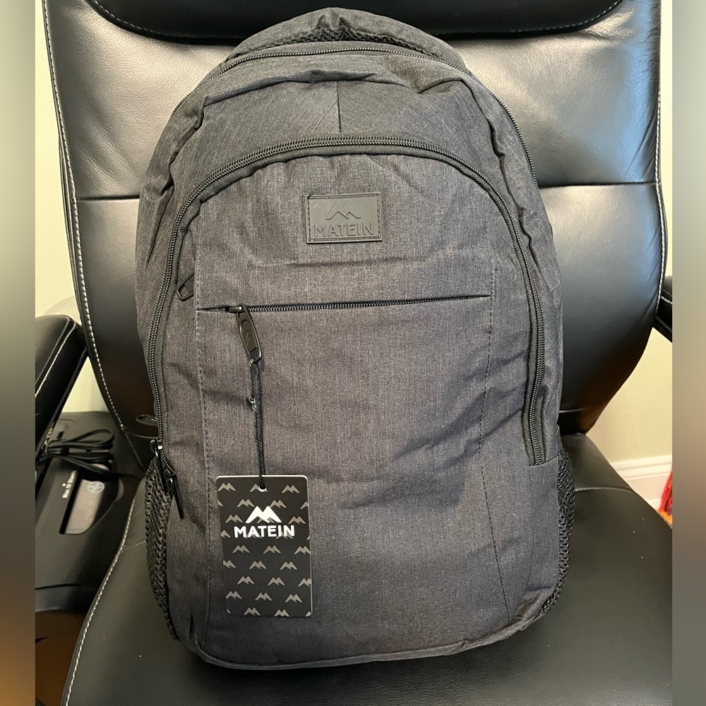Black Backpack with Padded Straps and Modern Design